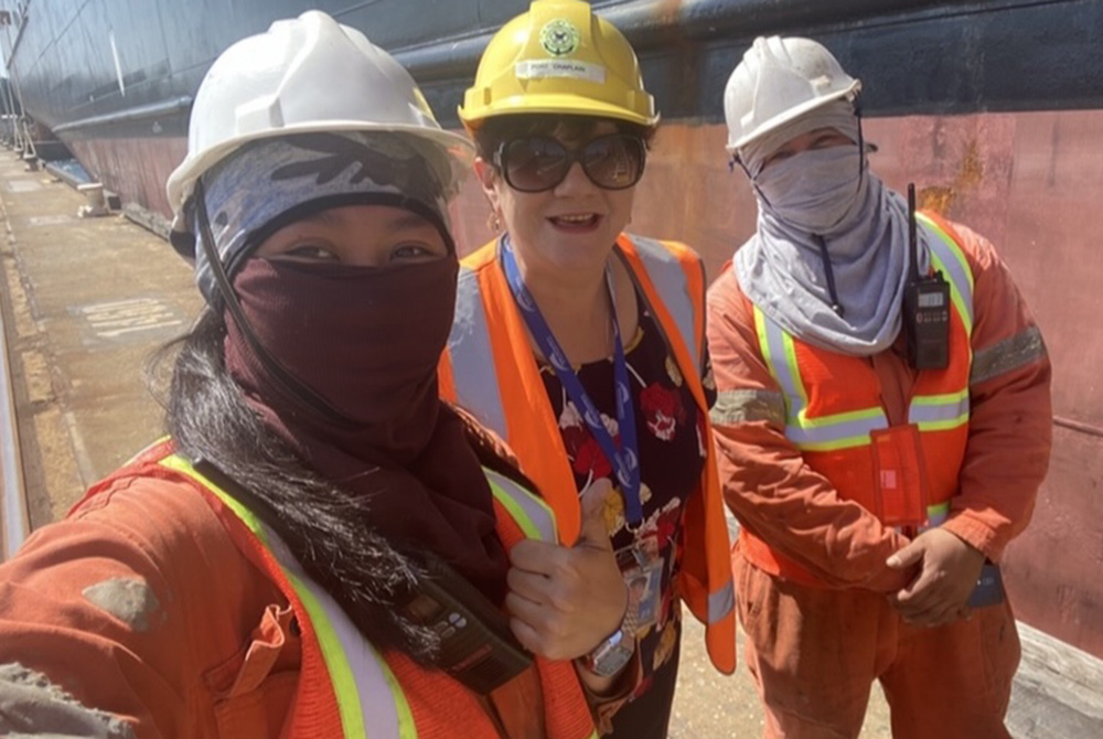 Sr. Mary Leahy poses for a selfie at Port Botany in Sydney, Australia, with Philippine seafarers "who were so excited to receive a care package." (Courtesy of Mary Leahy)
