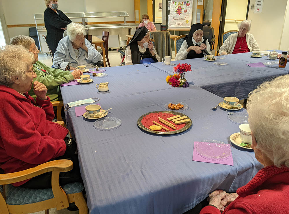 A favorite part of Julia Gerwe's service now is communing and being with the Sisters of Charity of Nazareth, Kentucky, which she did recently during this February's "Tea, Cookies, and Conversation" event. (Courtesy of Julia Gerwe)