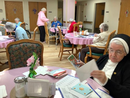 Sisters of St. Joseph of Peace at the St. Michael Villa in Englewood Cliffs, New Jersey, write notes to residents of Peace Care St. Ann's and Peace Care St. Joseph's, the two long-term care facilities in Jersey City that cannot have visitors during the CO