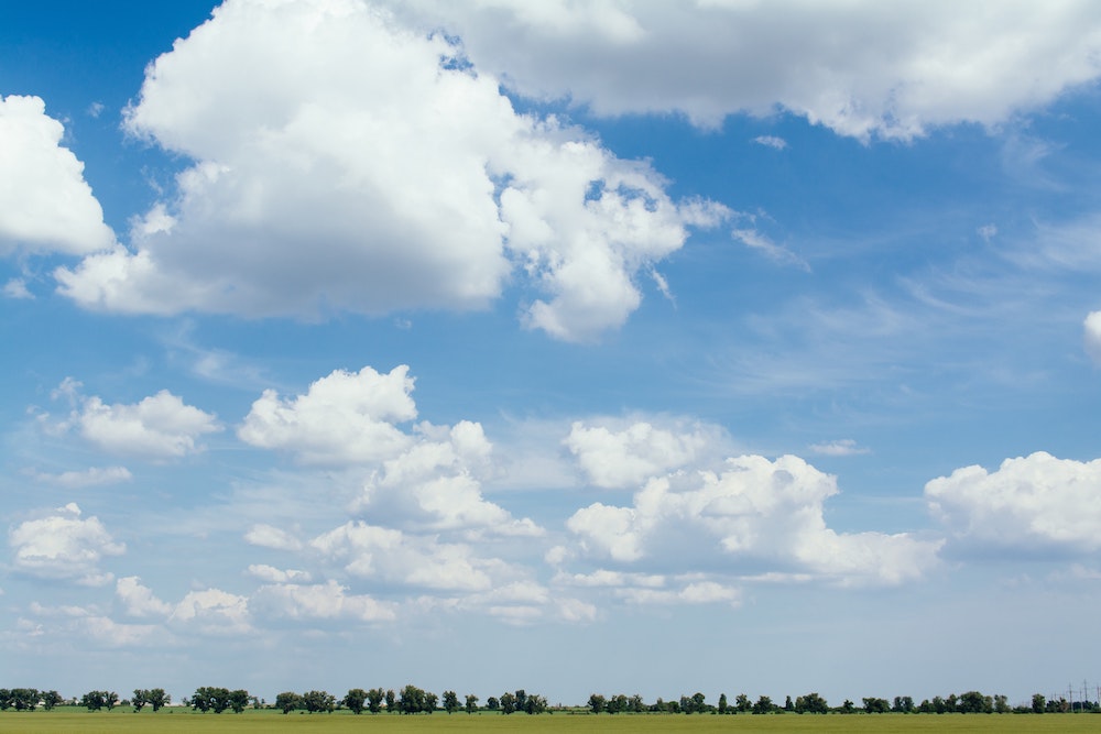 The everlasting sky stretches above us all, stretches wide and eternal. Like always. (Unsplash/Rodion Kutsaev)