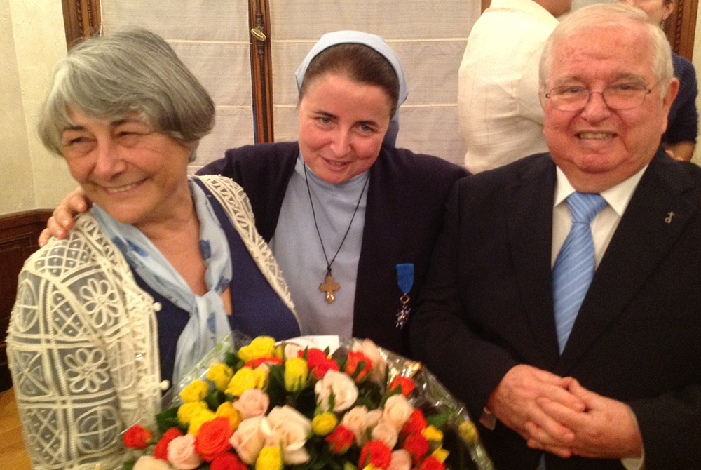 Sr. Sophie de Jésus with her parents, Christiane and Georges Renoux, after she received France's National Order of Merit in 2013. In 2015, she received the Legion of Honor for ACAY's programs in the Philippines and France. (Courtesy of Sr. Sophie de Jésus