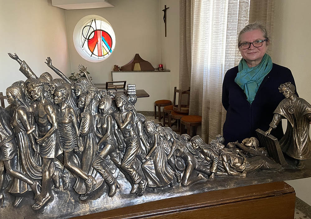 Comboni Missionary Sr. Gabriela Bottani, coordinator of Talitha Kum, the international network of religious sisters working to end human trafficking, with a model of the statue in a chapel at the offices of the International Union of Superiors General