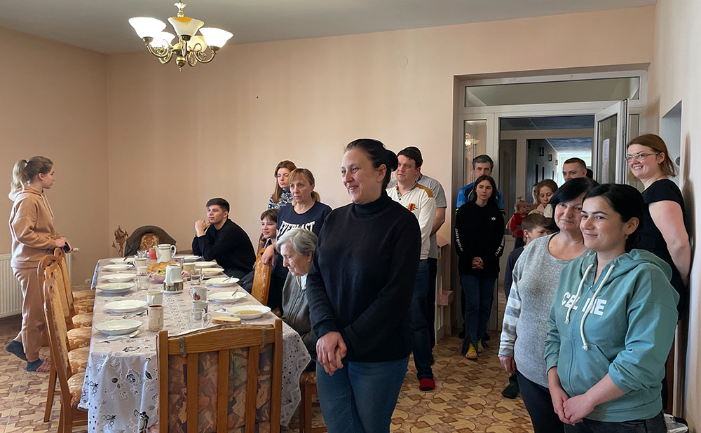 Ukrainian refugees wait for breakfast in March at the convent of St. Joseph of Saint-Marc in Mukachevo, a town in western Ukraine. (Courtesy of Ligi Payyappilly)