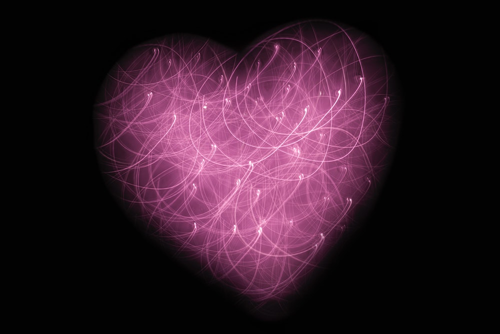 Heart image made of points of light (Unsplash/Jude Beck) Heart image made of points of light (Unsplash/Jude Beck)