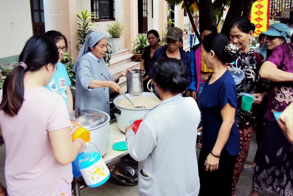 St. Paul de Chartres Sr. Josephine Huynh Thi Ly offers food to hospital patients at her convent in Hue City. (Joachim Pham) St. Paul de Chartres Sr. Josephine Huynh Thi Ly offers food to hospital patients at her convent in Hue City. (Joachim Pham)