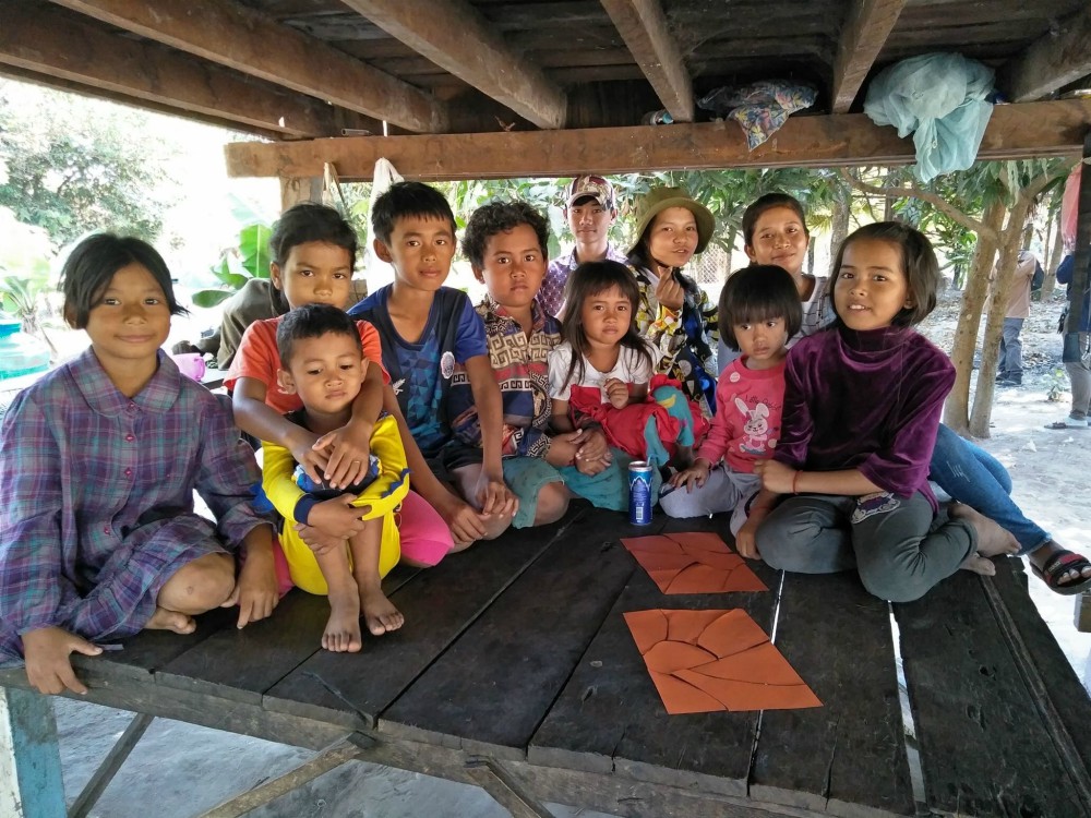 Village children during a visit from Lovers of the Holy Cross Sr. Hill Pen (Akarath Soukhaphon)