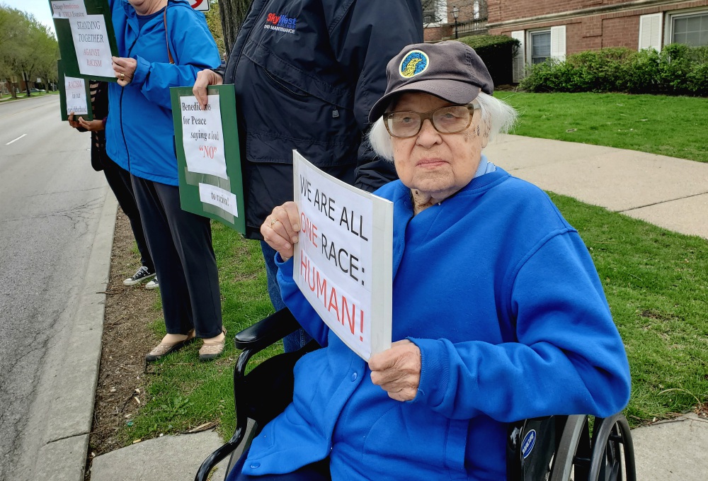 Chicago Benedictine Sr. Vivian Ivantic protests racism and police brutality at an April 2019 Stand Against Racism event in Evanston, Illinois. (Courtesy of the Benedictine Sisters of Chicago)