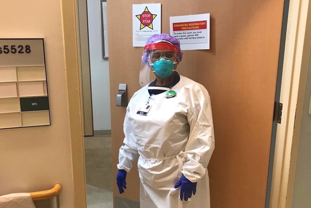 Sr. Vivien Echekwubelu, registered nurse and member of the Sisters of Notre Dame de Namur, in her protective gear on shift at a hospital in Baltimore, Maryland (Provided photo)