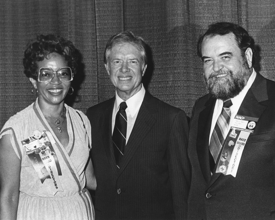 The author's father, right, with outgoing National Association of Counties President Charlotte Williams and U.S. President Jimmy Carter, who was a keynote speaker at the 1979 NACo meeting in Kansas City, Missouri. (Provided photo) The author's father, right, with outgoing National Association of Counties President Charlotte Williams and U.S. President Jimmy Carter, who was a keynote speaker at the 1979 NACo meeting in Kansas City, Missouri. (Provided photo)
