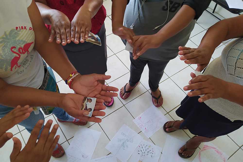 A group of women take part in a prayer to bless absent loved ones, as part of the Comboni Missionary Sisters' "Effatá" program to assist migrants in Tapachula, in the state of Chiapas, Mexico. (Courtesy of Pompea Cornacchia)