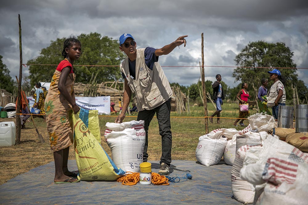 Catholic Relief Services staff provide emergency assistance in Madagascar. The African country has been seriously affected by drought in the last five years. (Catholic Relief Services/Jim Stipe)