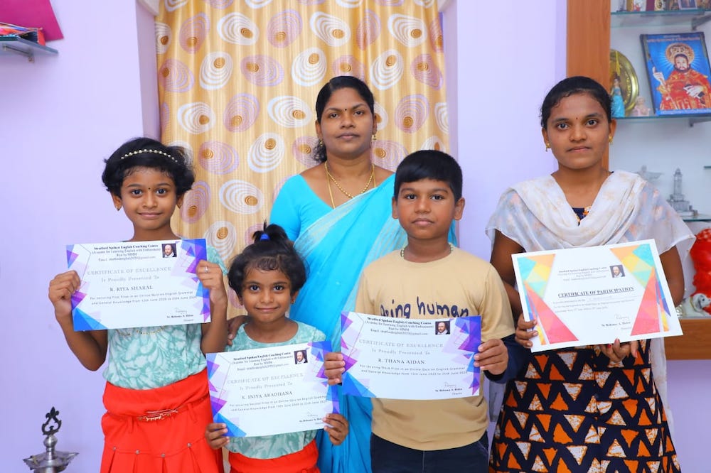 Students show the certificates awarded when they participated in the online quizzes for the English classes Sr. Helen Robancy held. (Robancy A. Helen)