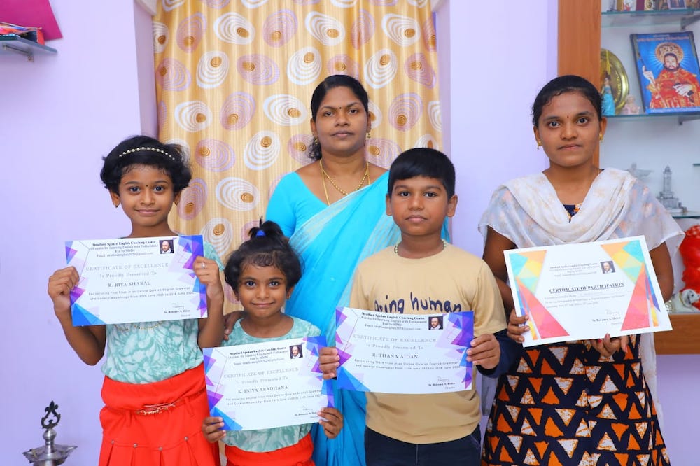 Students show the certificates awarded when they participated in the online quizzes for the English classes Sr. Helen Robancy held. (Robancy A. Helen)