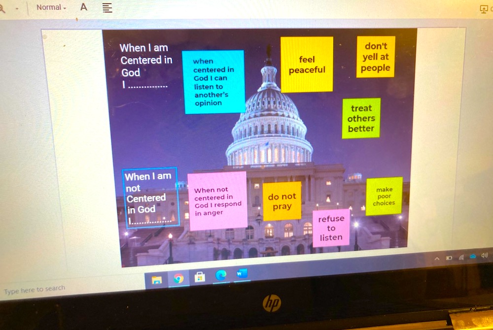 The lesson's whiteboard where students responded to prompts about being centered in God (Jennifer Wilson)