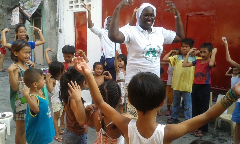 Sisters of Our Lady of the Immaculate Conception of Castres work with children from depressed areas at Emilie's Home in Quezon City, Philippines, in 2014. (Provided photo)