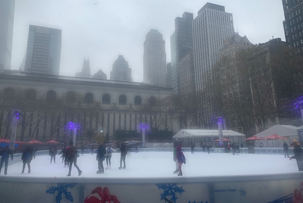 Snow begins to fall on Bryant Park's ice-skating rink in New York City. (Celina Kim Chapman)