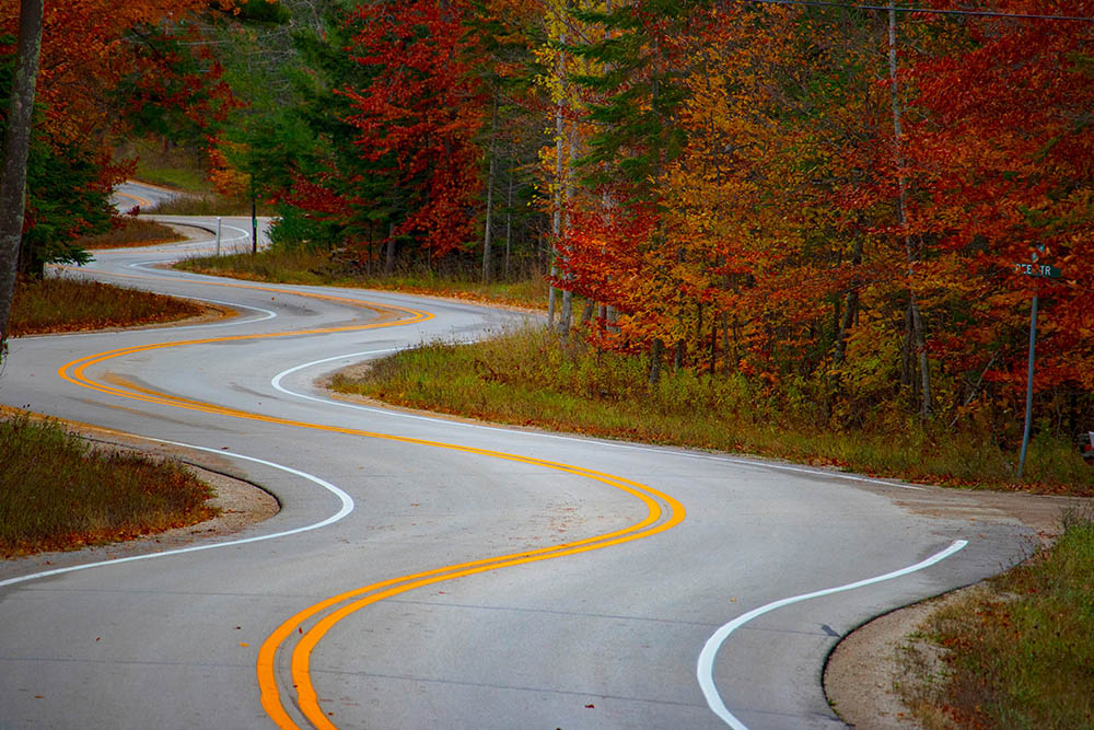 Curving road (Unsplash/Jacob Kiesow)