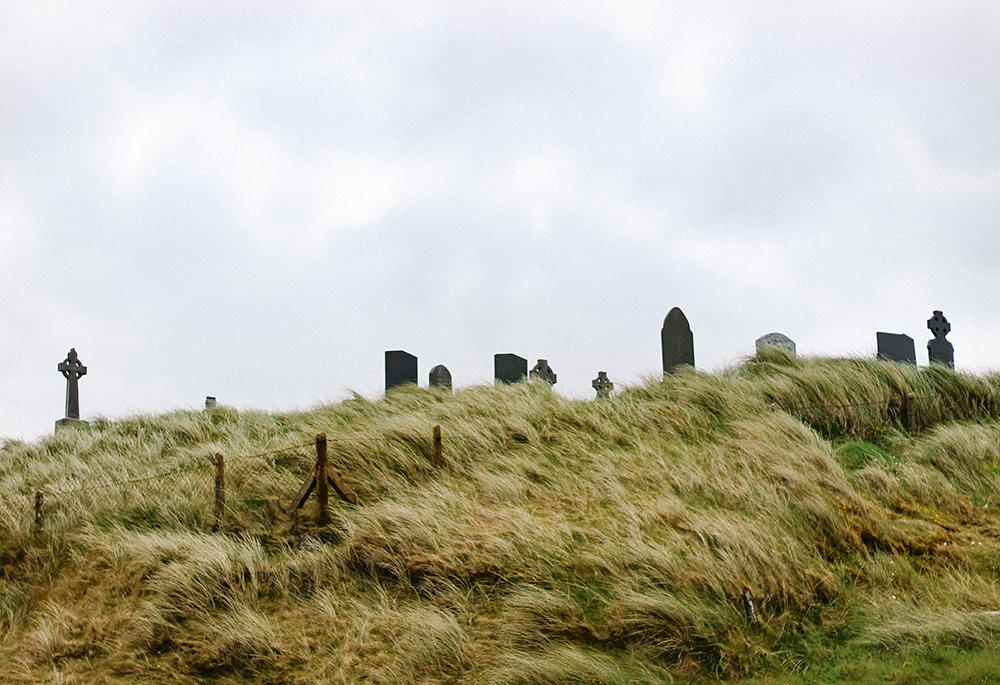 Gravestones in a picture taken at the Aran Islands, in Ireland (Unsplash/Jessica Johnston)
