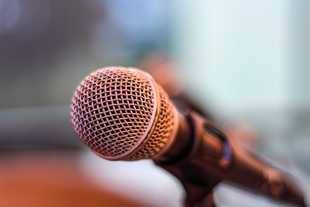 Close up of a microphone (Unsplash/Robinson Recalde)