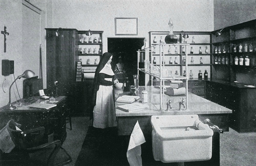 A nun works in the pharmacy at Misericordia Hospital, opened in summer 1918. (Catholic Historical Research Center, Archdiocese of Philadelphia)