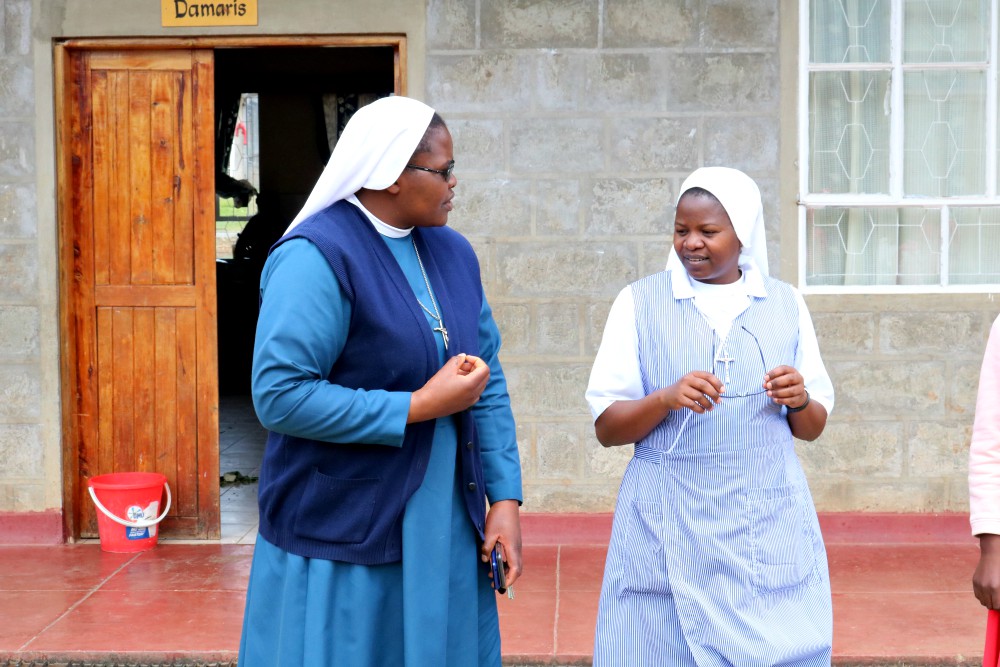 Sr. Redemptor Ikonga (left) chats with Sr. Joyce Nyaga at Talitha Kum Children's Home in Nyahururu, Kenya. (GSR photo / Doreen Ajiambo)