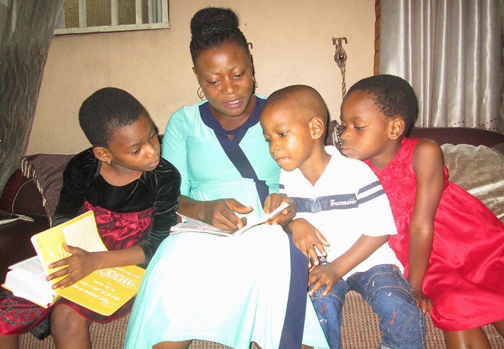 A mother and children in Nigeria: Through their privileged position in child upbringing, women have the power to contribute to eradicating victimization and injustice against themselves. (Caroline Mbonu) A mother and children in Nigeria: Through their privileged position in child upbringing, women have the power to contribute to eradicating victimization and injustice against themselves. (Caroline Mbonu)