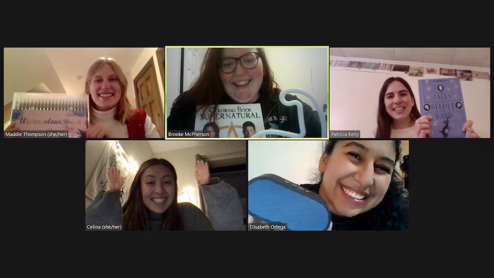 My fellow Good Shepherd Volunteers and I open each other's Secret Santa gifts over Zoom. (Brooke McPherson screenshot) My fellow Good Shepherd Volunteers and I open each other's Secret Santa gifts over Zoom. (Brooke McPherson screenshot)