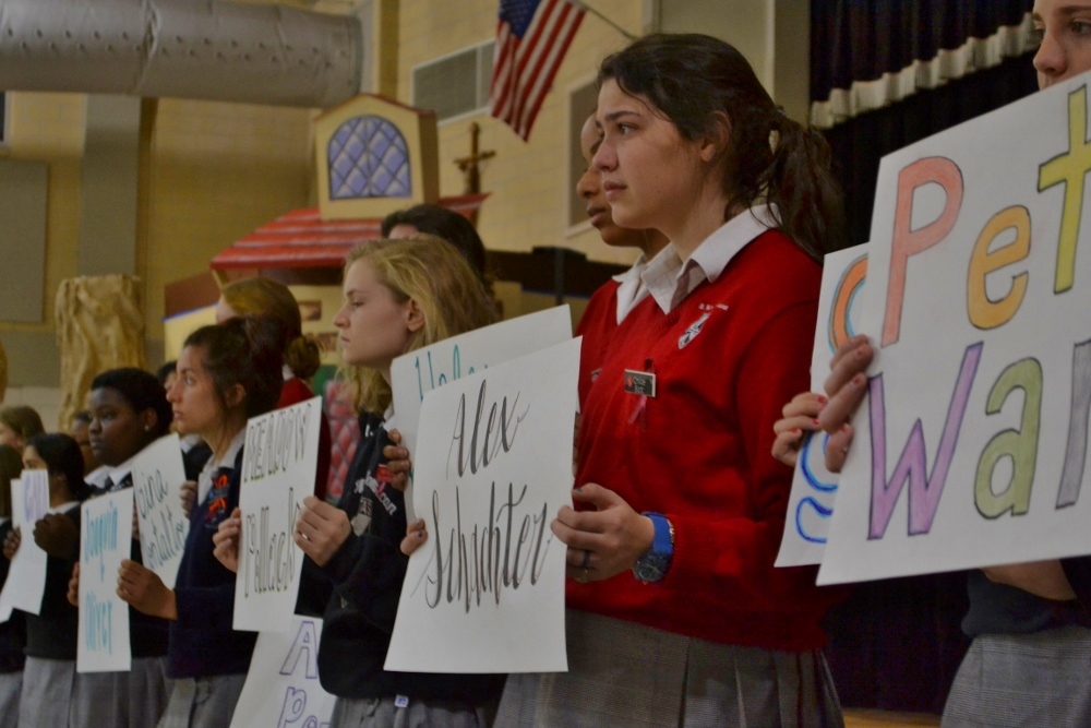 tudents at St. Mary's Dominican High School in New Orleans gather March 14 for 17 minutes to pray and remember the 17 students and faculty members killed in a Feb. 14 shooting in Parkland, Florida. Students carried signs with the names of those who died, and the Hail Mary was recited after each name was read. The school is run by the Dominican Sisters of Peace. (Courtesy of the Dominican Sisters of Peace)