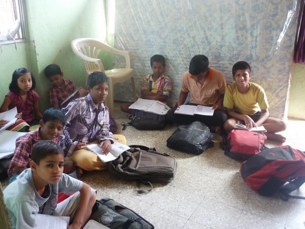 Students do homework at a Maher center in Pune, western India. (Lissy Maruthanakuzhy)