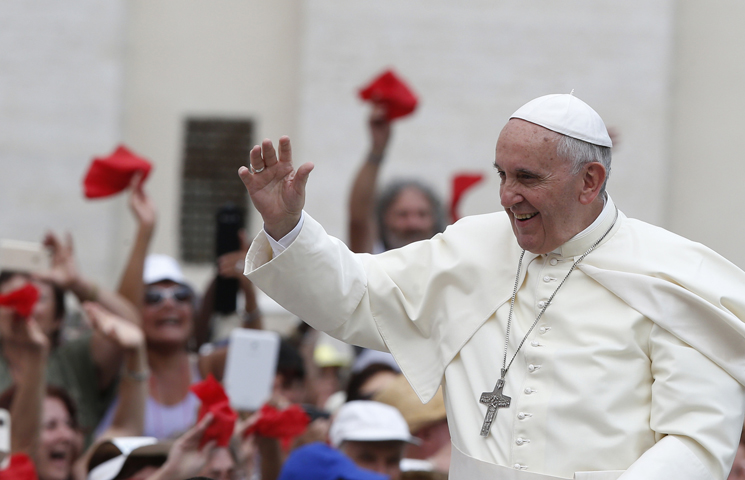 Pope Francis arrives to greet participants in the Renewal of the Spirit meeting in St. Peter's Square at the Vatican July 3. The meeting was with Catholics involved in the charismatic movement. (CNS photo/Paul Haring)