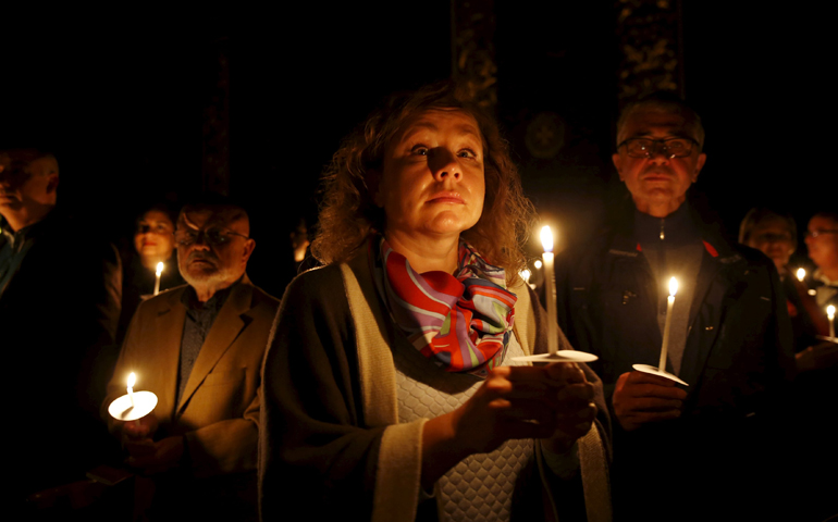  Worshippers hold candles during the Easter Vigil at St John's Co-Cathedral in Valletta, Malta, March 26, 2016. (CNS/Darrin Zammit Lupi, Reuters)