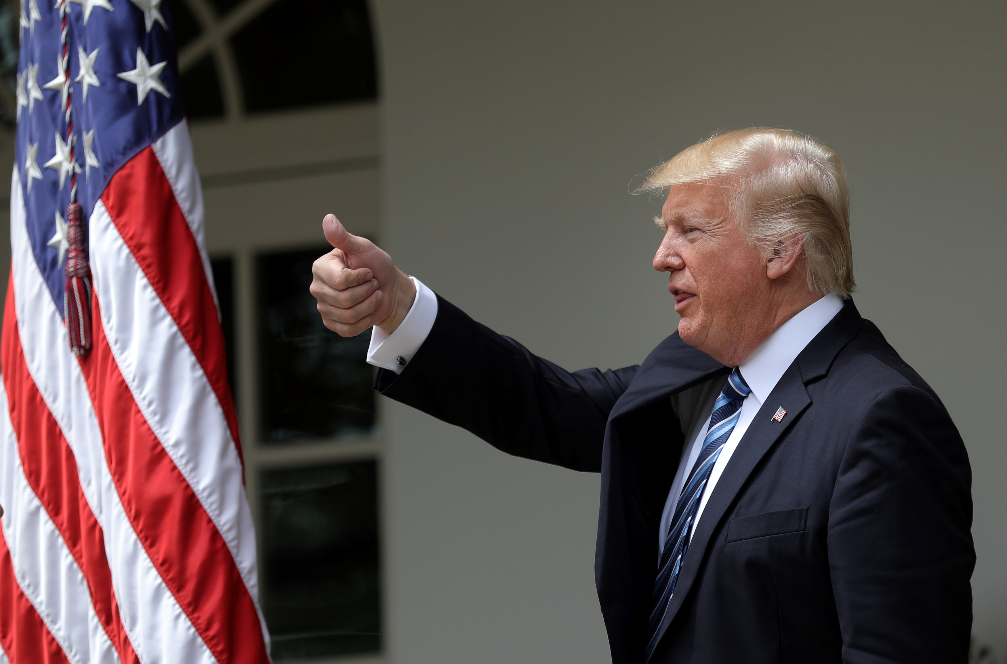 U.S. President Donald Trump gives a thumbs up during a National Day of Prayer event at the Rose Garden of the White House in Washington D.C., U.S., May 4, 2017. (REUTERS/Carlos Barria)