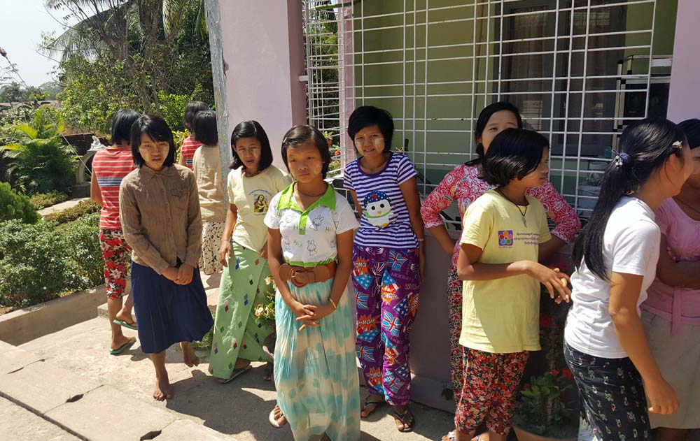 The 120 girls who live at St. Mary's Home are often orphans because of civil wars in Myanmar or from families who are too poor to care for them. They attend government-run schools but get lessons in music, dance, art, sewing and other skills at the home, taught by sisters and others. Some of the girls are wearing thanaka, made from finely ground bark and used as skin protection from the sun and for traditional designs. (GSR photo / Gail DeGeorge)