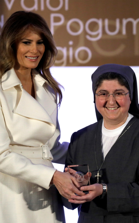 First lady Melania Trump presents Sister Carolin Tahhan Fachakh of Syria with the 2017 Secretary of State's International Women of Courage Award during a March 29 award ceremony at the State Department in Washington. Sister Tahhan Fachakh is a member of the Daughters of Mary Help of Christians. (CNS photo/Kevin Lamarque, Reuters)