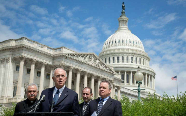 Supreme Knight Carl Anderson, CEO of the Knights of Columbus, speaks near the U.S. Capitol in Washington June 7. He, along with members of Congress, expressed support for the bipartisan Iraq and Syria Genocide Emergency Relief and Accountability Act. (CNS/Tyler Orsburn)