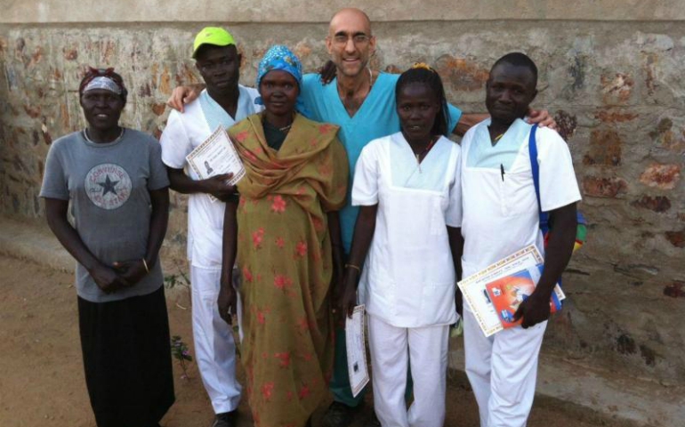 Dr. Tom Catena is pictured with his medical team in outside Mother of Mercy Hospital in Gidel, Sudan, in 2013. (CNS/courtesy CMMB)