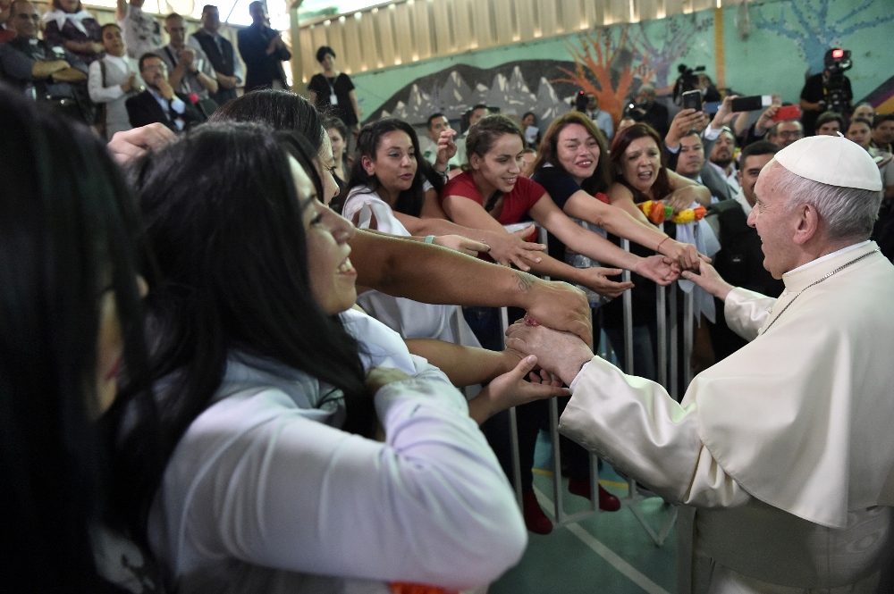 Pope Francis greets people during his visit to San Joaquín central women's prison in Santiago, Chile, Jan. 16. (CNS / Reuters / L'Osservatore Romano)