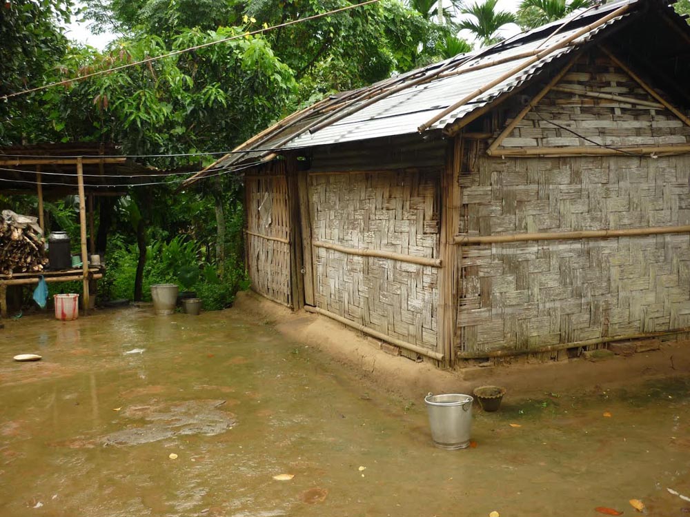 A bamboo house under water in a village in Tura, Assam (Lissy Maruthanakuzhy)