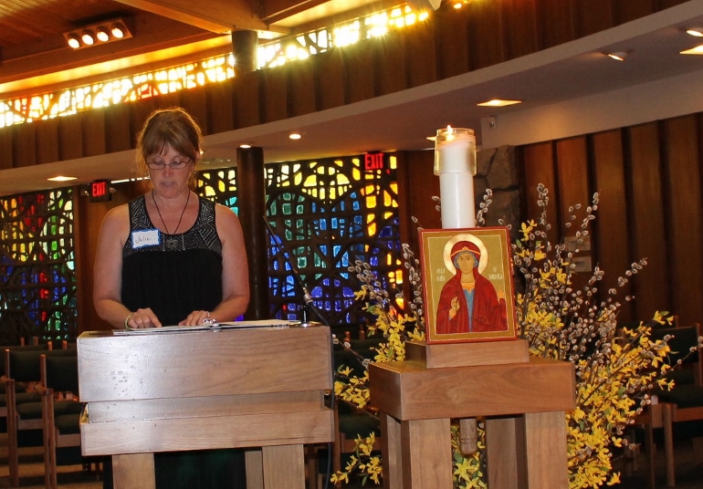 A woman leads a St. Mary of Magdala prayer service held at a Michigan parish in 201.2 (Courtesy of FutureChurch)