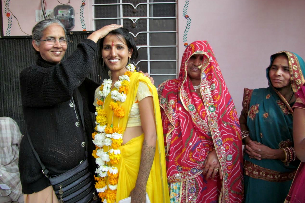 Sr. Mariola Sequeira blesses a bride before her marriage in Ajmer. (Saji Thomas)