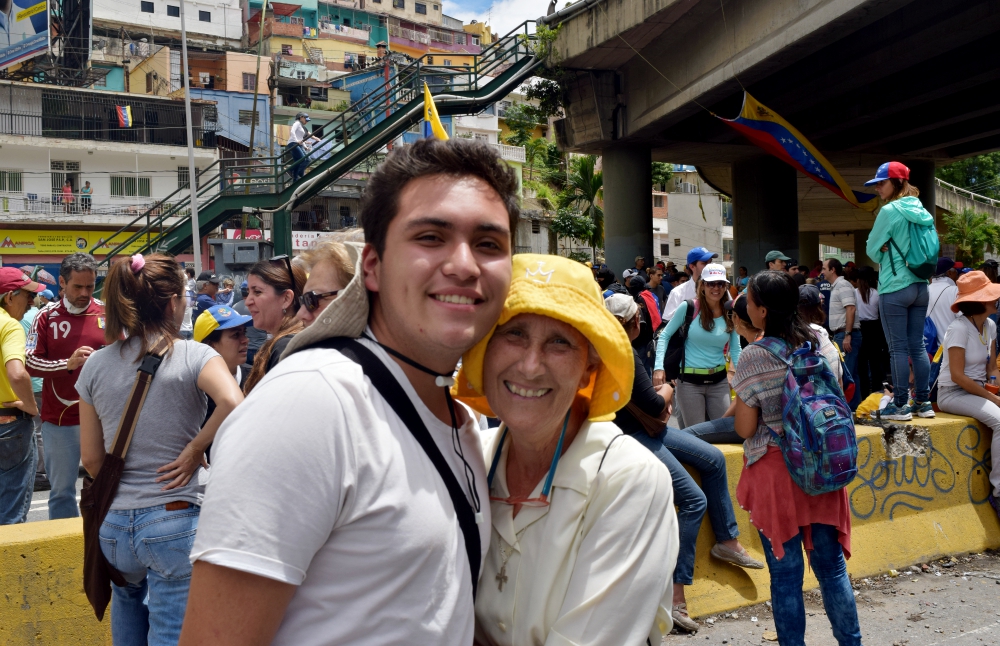 Dominican Sr. Purificación Maldonado Fernández poses for a photo with one of her former students during an anti-government protest June 14 in Caracas, Venezuela. (Cody Weddle)