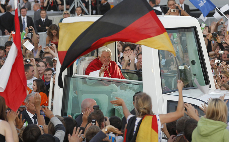 Pope Benedict XVI waves as he arrives to lead a prayer vigil with young people in Freiburg im Breisgau, Germany, in 2011. The German-born pontiff visited his homeland Sept. 22-25. (CNS/Reuters/Arnd Wiegmann)