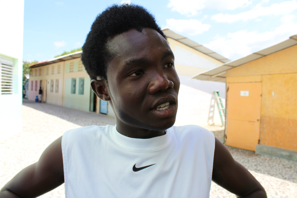 Bienjuste Sedlin: Bienjuste Sedlin, 17, lives in Wharf Jeremile and knows too well Haiti's challenges, contradictions and aspirations. (GSR photo / Chris Herlinger)