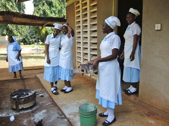 Students at the Bigwa Secondary School in their cooking class, which includes nutrition and hygiene. (GSR/Melanie Lidman)