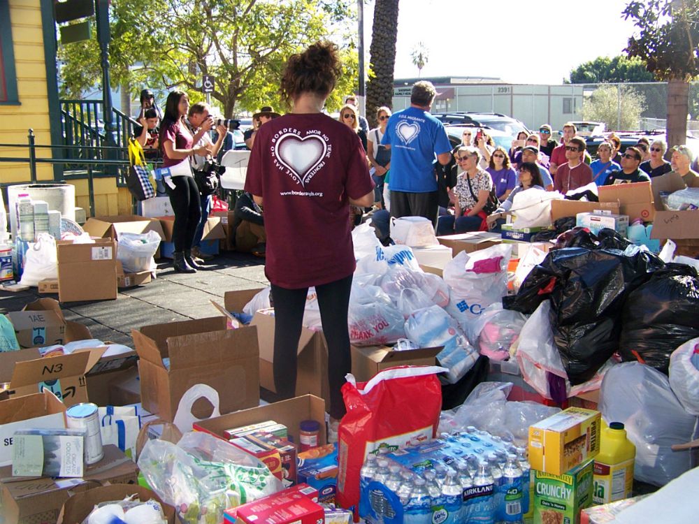 Volunteers in the Caravan of Love prepare Dec. 10 to distribute donated items to asylum seekers in Tijuana waiting to cross the border into the United States. (Courtesy of Rosemary Nicholson)