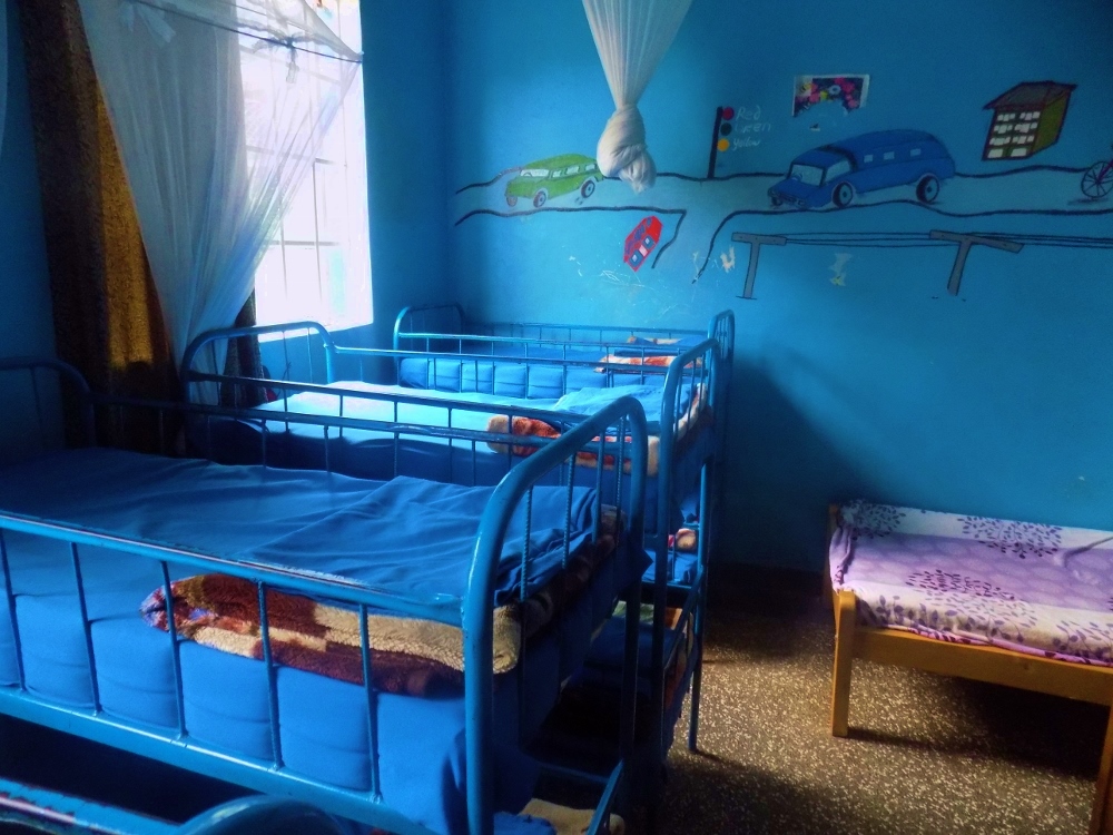 Cribs in the boys dormitory of the Nsambya Babies Home in Kampala, Uganda, where children stay until they are adopted or reach age 5, when they transition to another facility run by sisters (Courtesy Nsambya Babies Home/Cindy Ayebale)