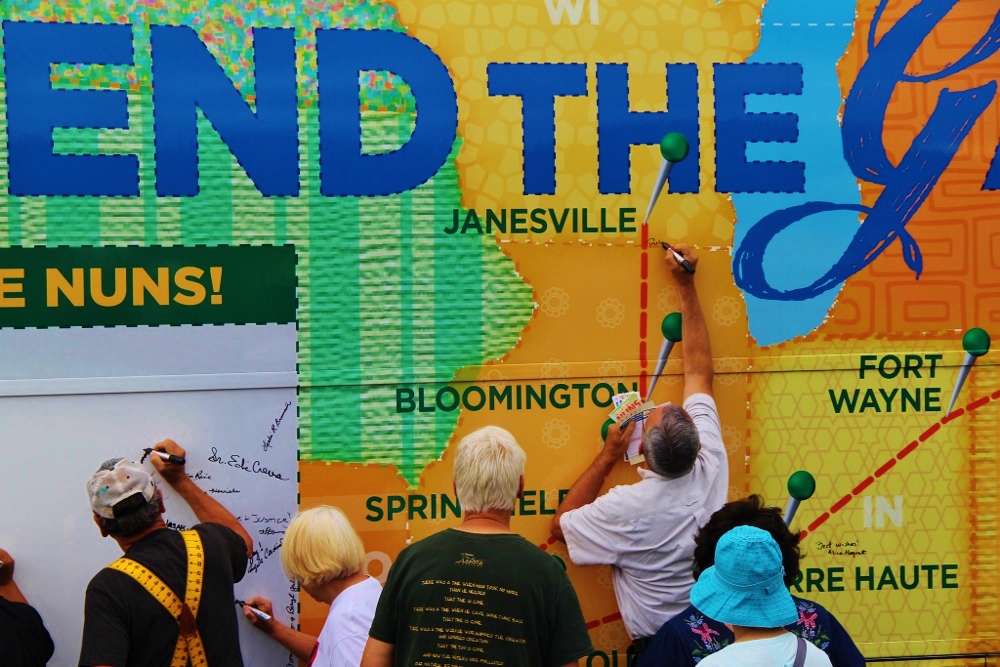 The design of the "Mend the Gaps" bus for the 2016 Nuns on the Bus tour resembles a quilt. (Jennifer Wong / Courtesy of NETWORK)