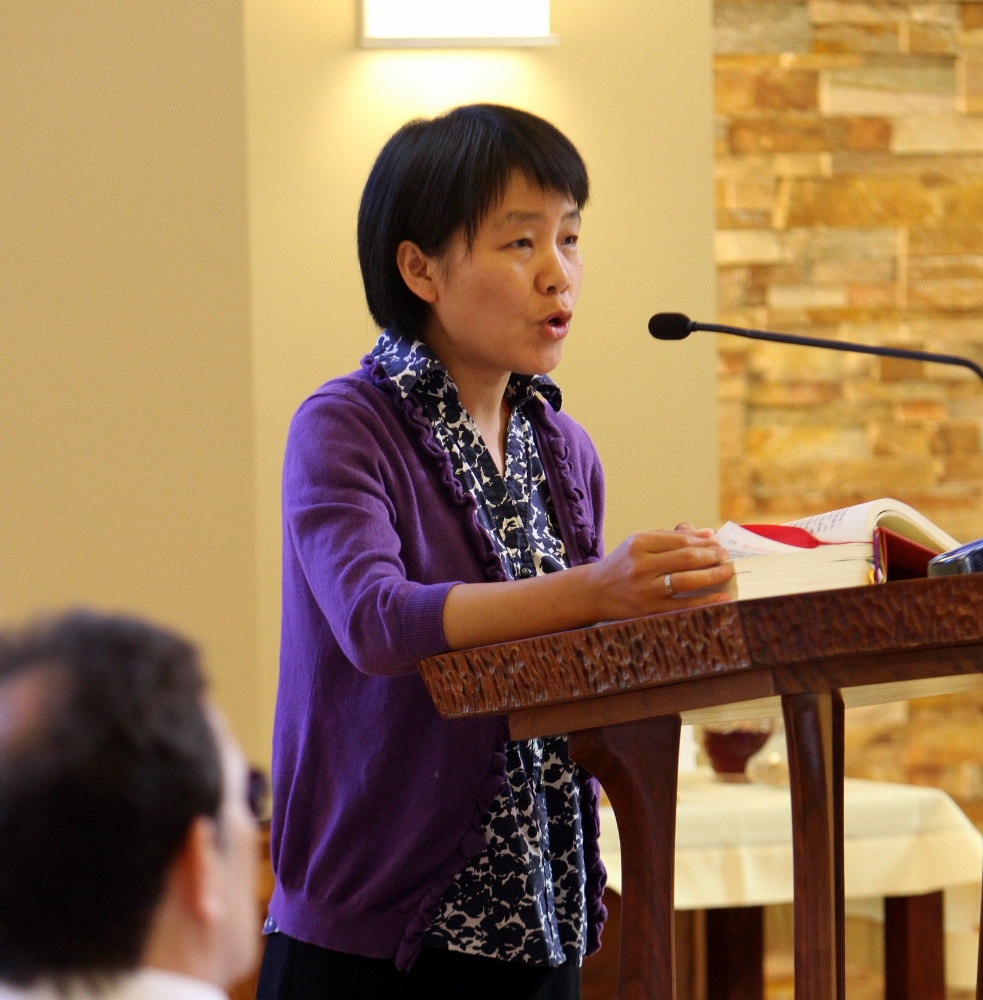 Sr. Clara Zhang Jin Ping, a member of the Sisters of the Blessed Virgin Mary in Hanyang, China, serves as a lector during Mass at the Cenacle Retreat Center in Ronkonkoma, N.Y., Aug. 20. Zhang, a participant in Maryknoll's Chinese Seminary Teachers and Formators Project, is pursuing a master's degree in pastoral ministry and social work at Boston College. (CNS photo/Gregory A. Shemitz)