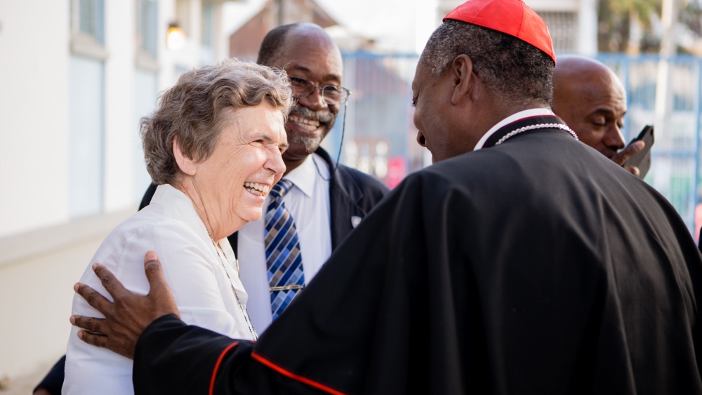 At the Jan. 15, 2015, dedication of St. Francis de Sales Hospital in Port-au-Prince, Haiti, CHA president and chief executive officer Daughter of Charity Sr. Carol Keehan greeted Cardinal Chibly Langlois, bishop of the diocese of Les Cayes and president of the Bishops Conference of Haiti. (© The Catholic Health Association)