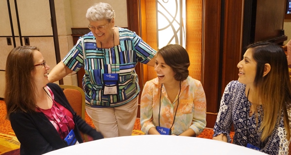 From left, Esther Sanborn, Sr. Carol Mucha, Megan Lavelle and Janna Eudave visit during the 2016 Gathering of the Sisters of Mercy West Midwest Community. (Provided photo)